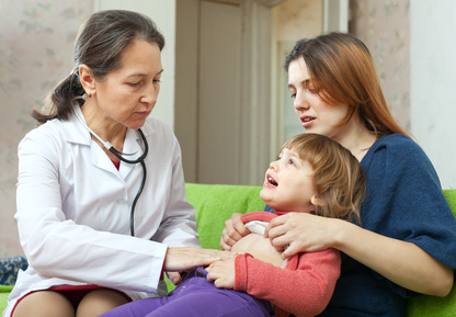 doctor examining  baby