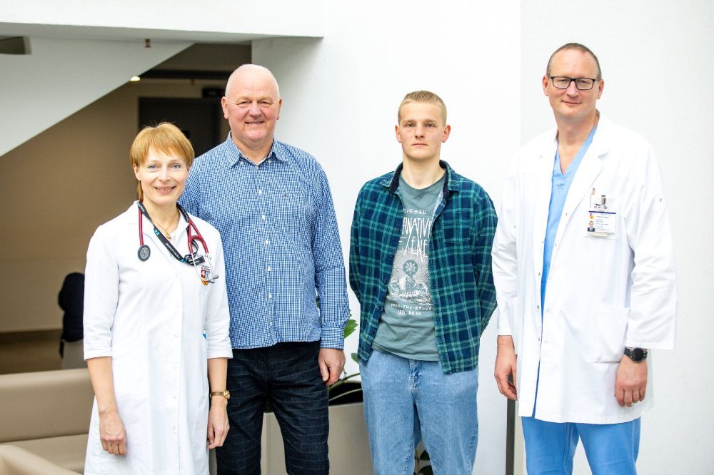 Gydytojai Giedrė Bakšytė, Vytautas Zabiela ir pacientas su sūnumi 